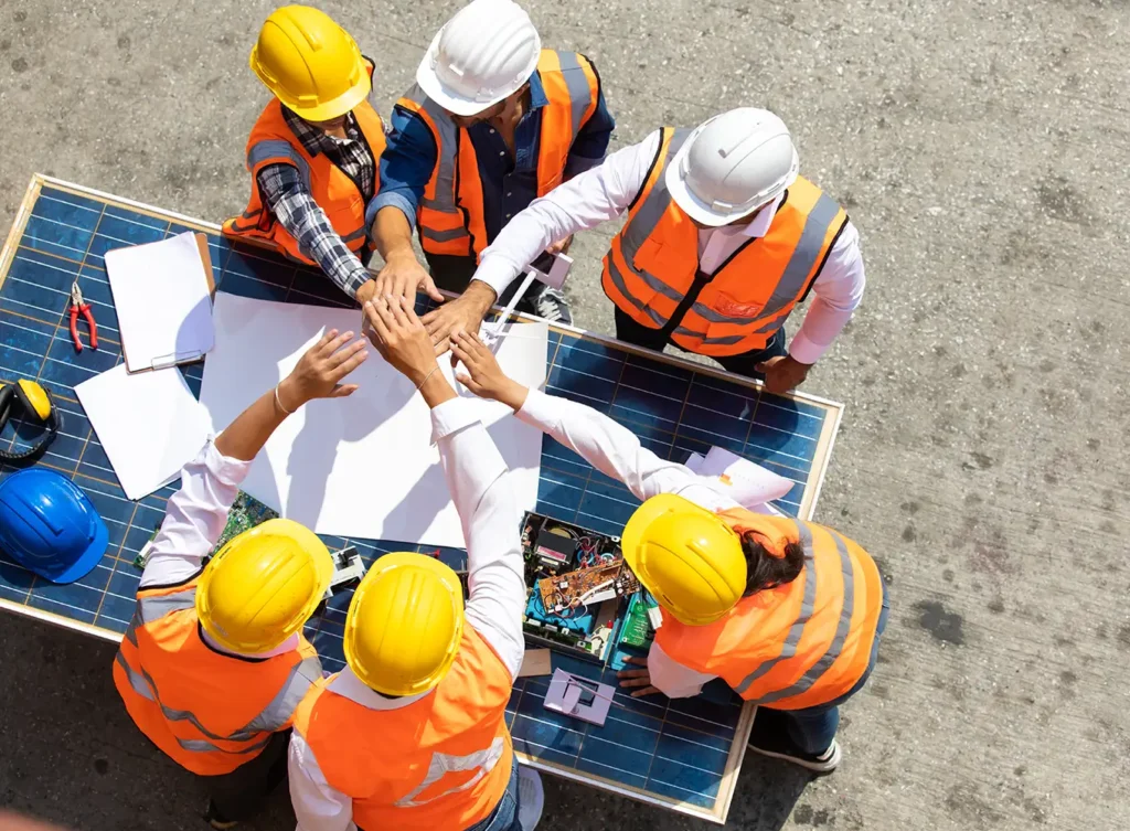 teamwork of construction team with safety project manager on site - central illinois